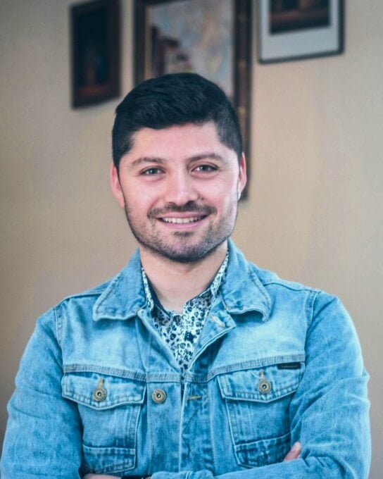 a man wearing a jean jacket