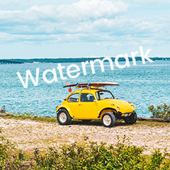 Vintage yellow car parked by a lake sample image 2