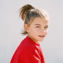 The thumbnail of a girl in red sweater