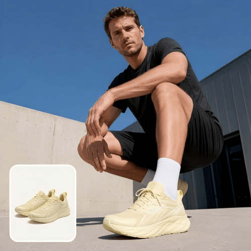 konvertiere ein bild von ein paar weißen schuhen in ein fashion model bild mit einem coolen mann
