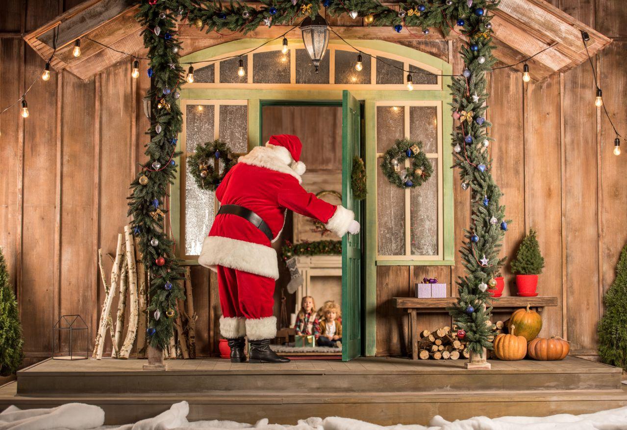 Santa Claus in front of the door