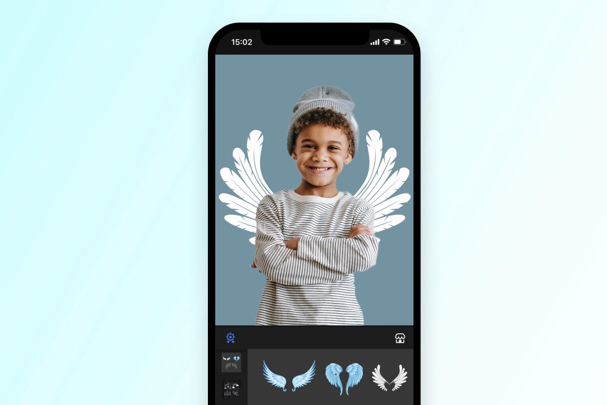 Use Fotor app to add an angel wing to a little boys photo