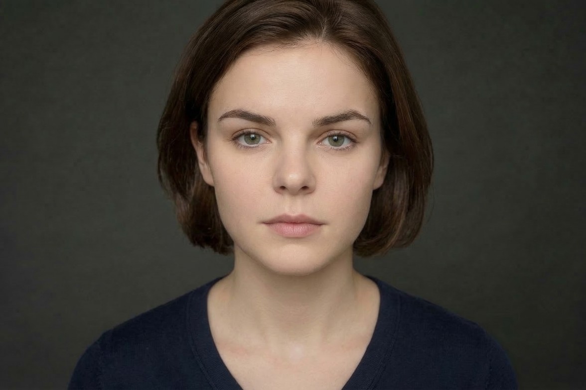 The original photo of a young woman with dark hair